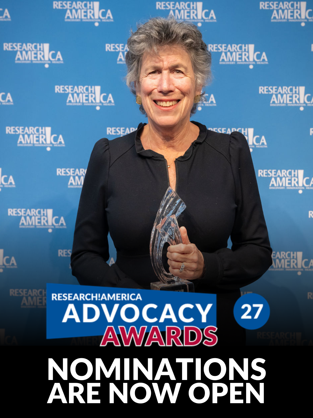 A smiling woman stands in front of a blue Research!America step-and-repeat backdrop, holding a clear glass award. Overlaid text reads, "Research!America Advocacy Awards," with a blue circle displaying "27," and "Nominations Are Now Open" in large white letters across the bottom.